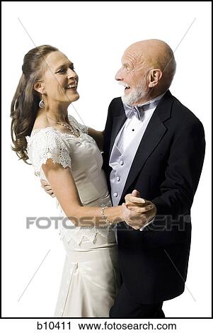 Stock Image - Close-up of a senior couple dancing. Fotosearch