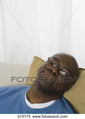 Stock Image - Close-up of a senior man sleeping. Fotosearch
