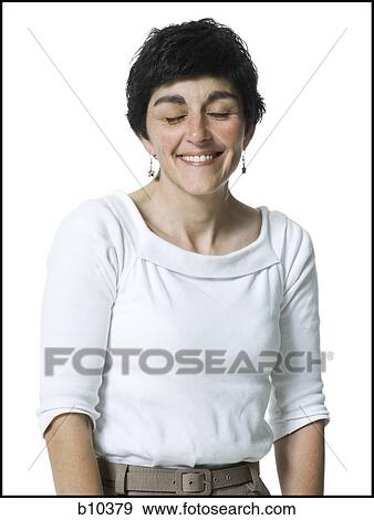 Stock Photo - Close-up of a senior woman smiling with her eyes closed. Fotosearch