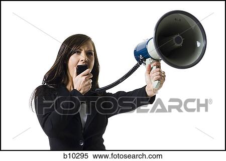 Close-up of a teenage girl shouting into a megaphone View Large Photo Image Stock Photography - Close-up of a teenage girl shouting into a megaphone. Fotosearch