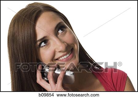 Close-up of a teenage girl using a mobile phone View Large Photo Image Picture - Close-up of a teenage girl using a mobile phone. Fotosearch