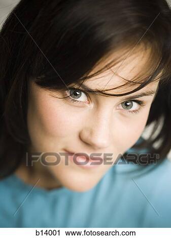 Stock Image - Close-up of a woman smiling. Fotosearch