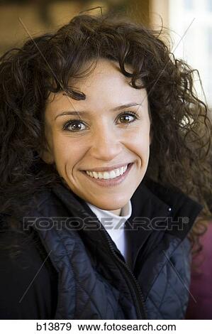 Stock Photo - Close-up of a woman smiling. Fotosearch
