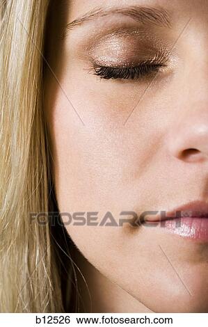 Close-up of a woman's face View Large Photo Image Stock Photograph - Close-up of a woman's face. Fotosearch