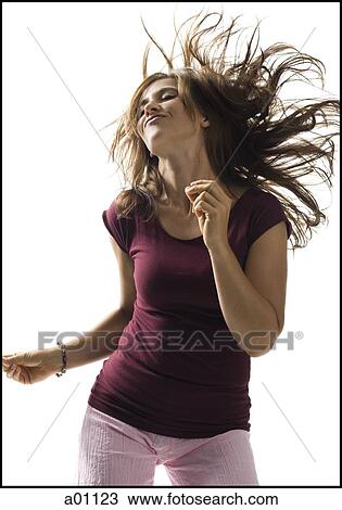 Stock Image - Close-up of a young woman dancing. Fotosearch