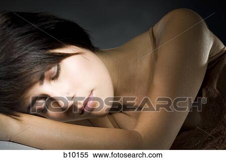 Stock Photography - Close-up of a young woman sleeping. Fotosearch