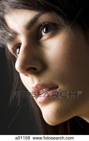Stock Photo - Close-up of a young woman. Fotosearch