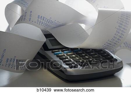 Close-up of an adding machine tape View Large Photo Image Stock Photo - Close-up of an adding machine tape. Fotosearch