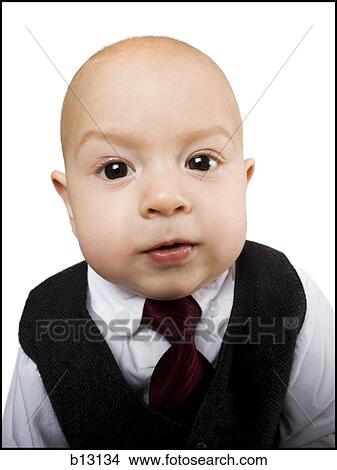 Picture - Close-up of baby boy in business suit. Fotosearch