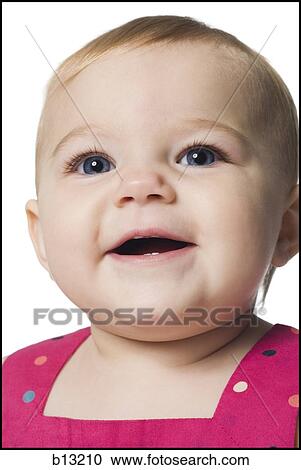 Close-up of baby girl smiling View Large Photo Image Stock Image - Close-up of baby girl smiling. Fotosearch