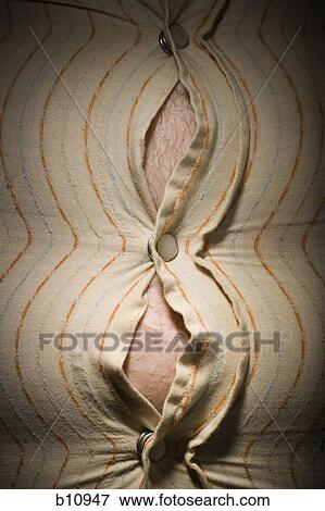 Close-up of fat stomach bursting through shirt View Large Photo Image Stock Photo - Close-up of fat stomach bursting through shirt. Fotosearch
