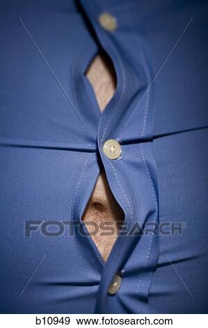 Close-up of fat stomach bursting through shirt View Large Photo Image Stock Photo - Close-up of fat stomach bursting through shirt. Fotosearch