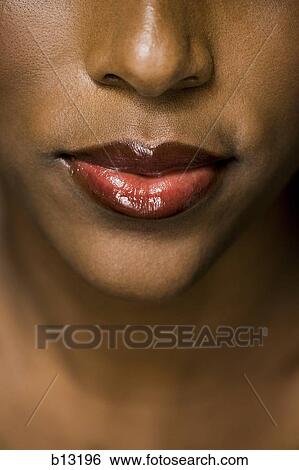Close-up of female mouth and nose View Large Photo Image Stock Photograph - Close-up of female mouth and nose. Fotosearch