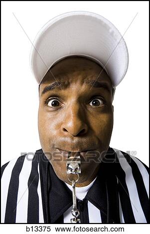 Close-up of referee blowing whistle View Large Photo Image Stock Photography - Close-up of referee blowing whistle. Fotosearch