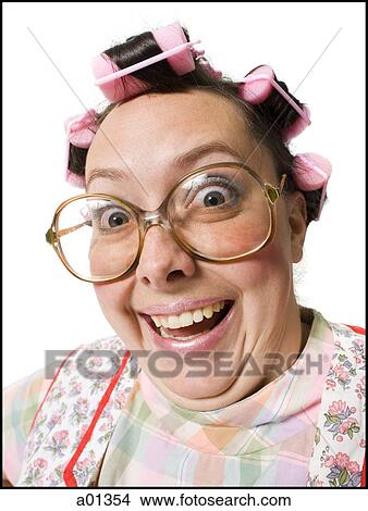 Close-up of woman in curlers with glasses View Large Photo Image Picture - Close-up of woman in curlers with glasses. Fotosearch