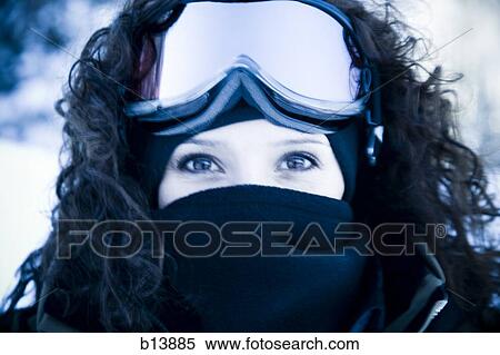 Close-up of woman with ski goggles and face mask View Large Photo Image Stock Photography - Close-up of woman with ski goggles and face mask. Fotosearch