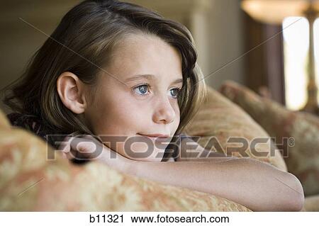 Close-up of young girl's smiling face View Large Photo Image Stock Image - Close-up of young girl's smiling face. Fotosearch