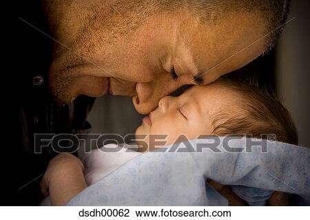 Closeup of father with sleeping baby View Large Photo Image Stock Image - Closeup of father with sleeping baby. Fotosearch