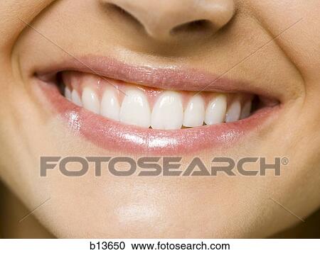 Closeup of female smiling View Large Photo Image Stock Image - Closeup of female smiling. Fotosearch