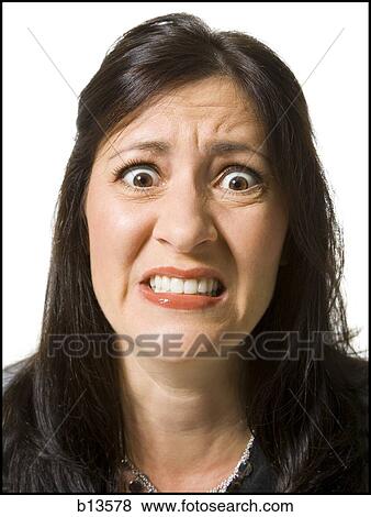 Stock Photo - Closeup of woman looking worried. Fotosearch