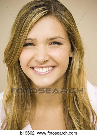 Stock Image - Closeup of woman smiling. Fotosearch
