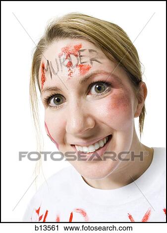Closeup of woman with Murder on forehead View Large Photo Image Stock Image - Closeup of woman with Murder on forehead. Fotosearch