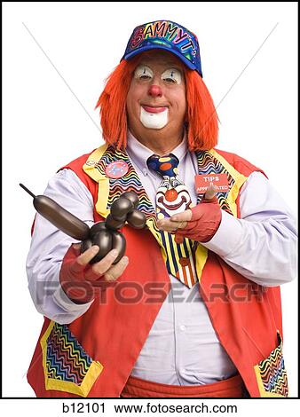 Stock Image - Clown with balloon animal. Fotosearch
