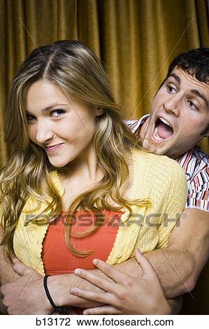 Couple in photo booth laughing View Large Photo Image Stock Image - Couple in photo booth laughing. Fotosearch