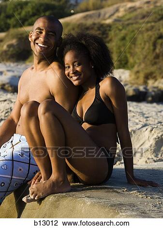Couple on a beach View Large Photo Image Stock Image - Couple on a beach. Fotosearch