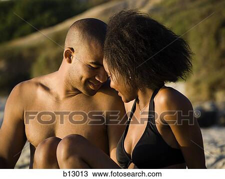 Couple on a beach View Large Photo Image Stock Image - Couple on a beach. Fotosearch