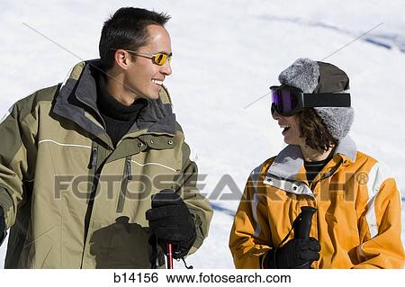Couple skiing View Large Photo Image Stock Photograph - Couple skiing. Fotosearch