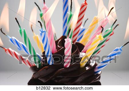 Cupcake with birthday candles View Large Photo Image Stock Image - Cupcake with birthday candles. Fotosearch