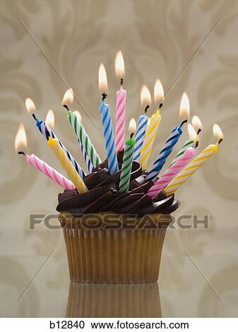 Cupcake with birthday candles View Large Photo Image Stock Image - Cupcake with birthday candles. Fotosearch