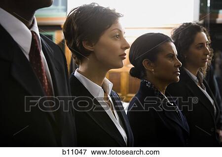 Stock Photo - Defendants and lawyers in courtroom. Fotosearch