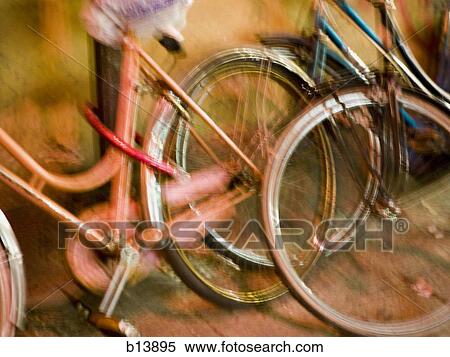 Detailed view of bicycles motion blur View Large Photo Image Stock Photography - Detailed view of bicycles motion blur. Fotosearch