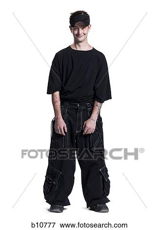 Disheveled man with a visor grinning View Large Photo Image Stock Photo - Disheveled man with a visor grinning. Fotosearch