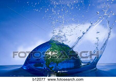Stock Photo - Earth globe floating in water. Fotosearch