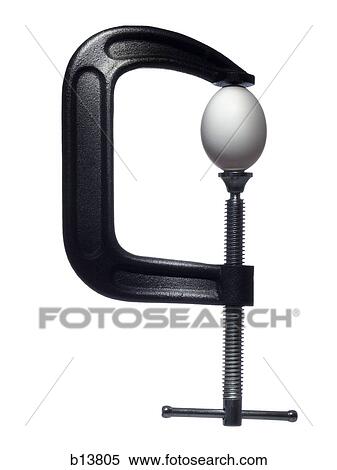 Stock Photography - Egg in vice. Fotosearch
