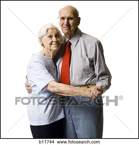 Elderly couple dancing together View Large Photo Image Picture - Elderly couple dancing together. Fotosearch