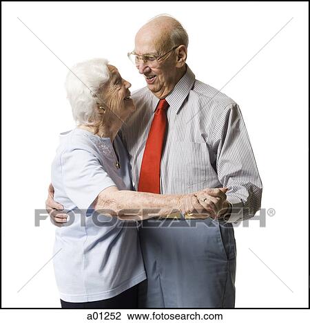 Elderly couple dancing together View Large Photo Image Stock Image - Elderly couple dancing together. Fotosearch