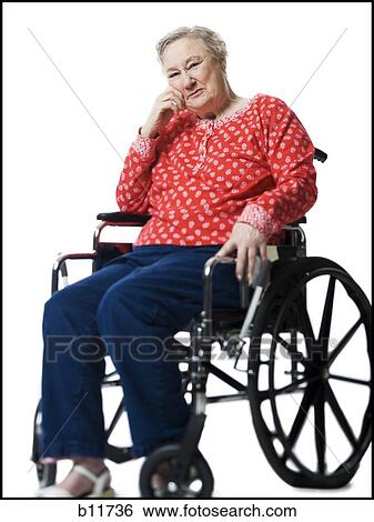 Elderly woman in a wheelchair View Large Photo Image Stock Photograph - Elderly woman in a wheelchair. Fotosearch