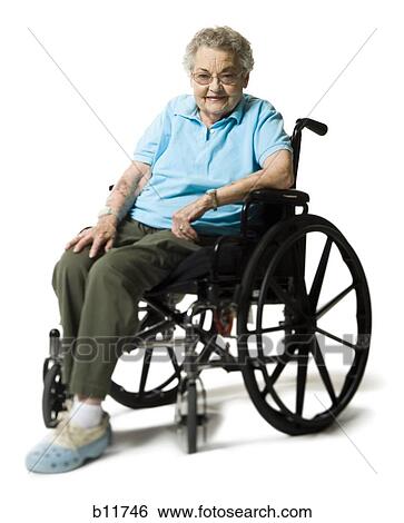 Stock Photograph - Elderly woman in a wheelchair. Fotosearch