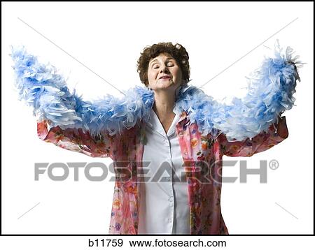 Stock Photo - Elderly woman with a feather boa. Fotosearch