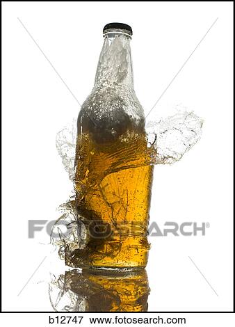 Exploding beer bottle View Large Photo Image Stock Photo - Exploding beer bottle. Fotosearch