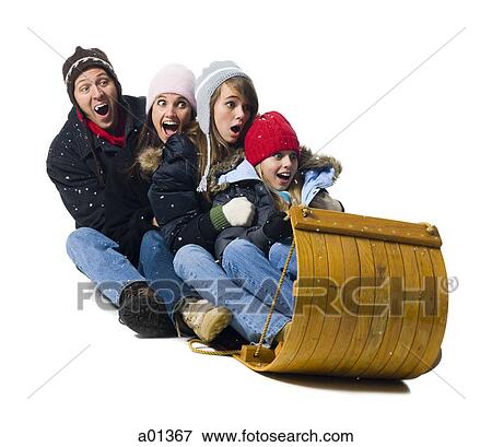 Stock Photo - Family on toboggan. Fotosearch