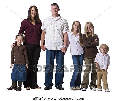 Stock Image - Family portrait of parents and daughters. Fotosearch