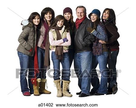 Stock Image - Family portrait with seven people in winter coats. Fotosearch
