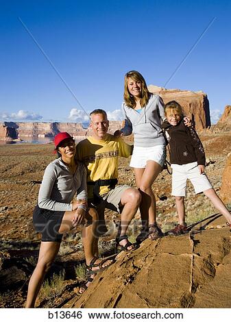 Family posing outdoors with rock formations View Large Photo Image Stock Photograph - Family posing outdoors with rock formations. Fotosearch