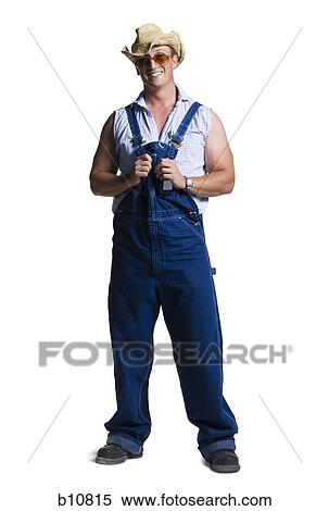 Stock Photography - Farmer wearing a straw hat with sunglasses. Fotosearch