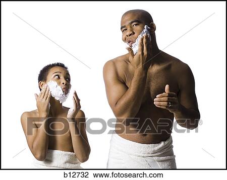Father and son shaving together View Large Photo Image Stock Image - Father and son shaving together. Fotosearch